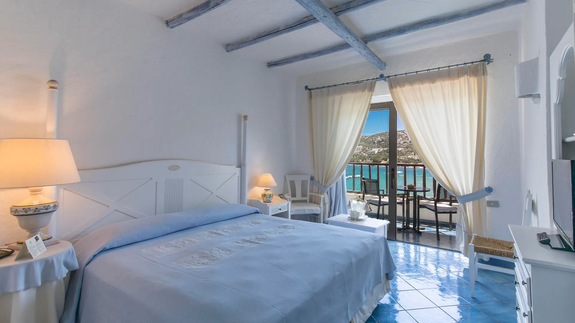 Club Hotel Baja Sardinia 4*,  Italy